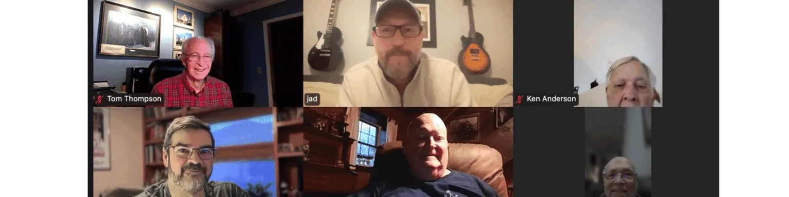 Participants in a virtual meeting smile and engage, with guitars and books visible in the background.